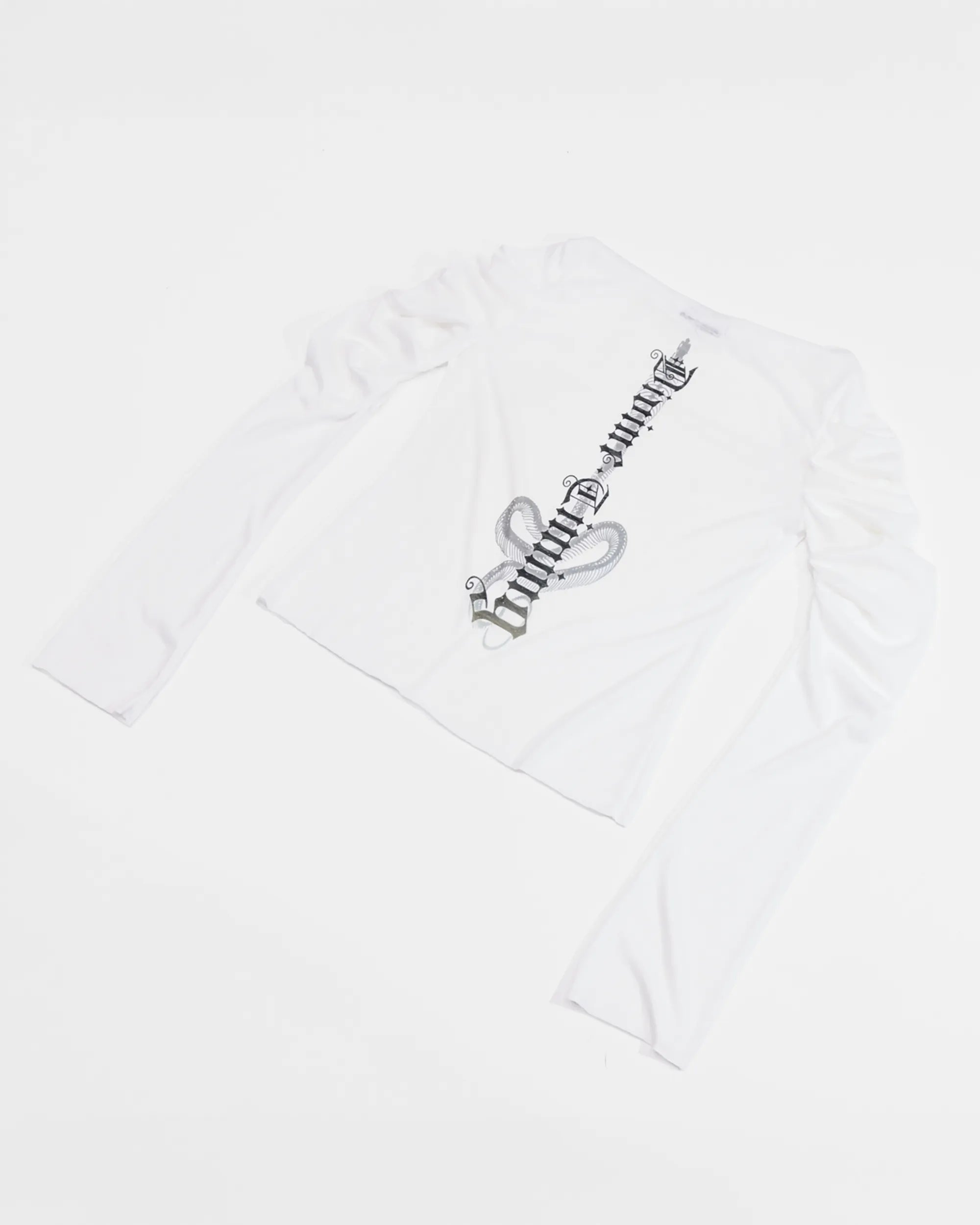 back view of white longsleeve top with ruched sleeves and back print