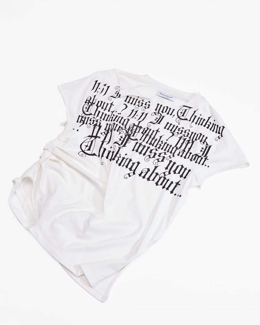 distressed white t-shirt with ruching on side and print