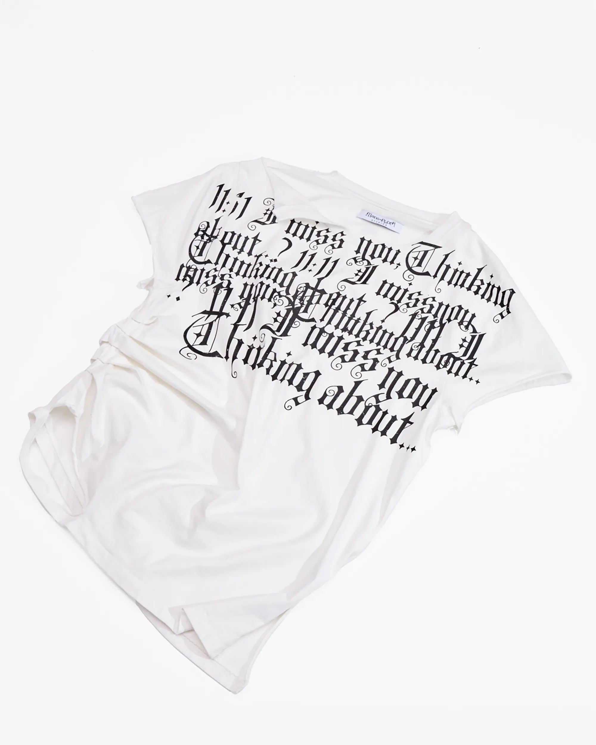 distressed white t-shirt with ruching on side and print