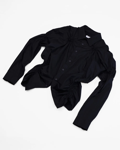 black shirt with shirring details